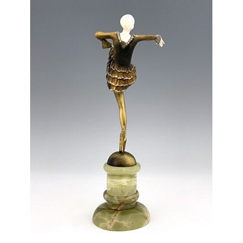 196 - Josef Lorenzl, an Art Deco gilt bronze and carved ivory figure, circa 1925, modelled as a dancer, in... 