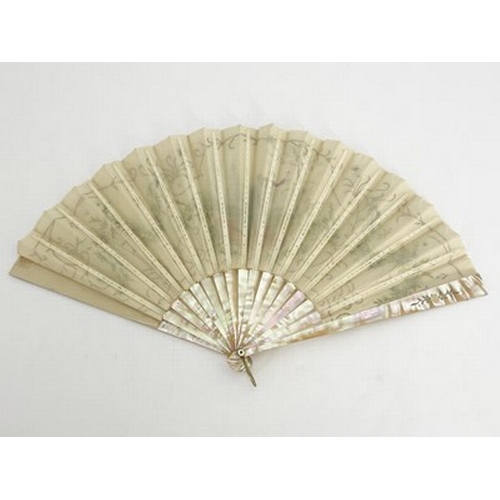 245 - An early 20th century Continental fan with mother of pearl sticks, the guards piqué with silver and ... 