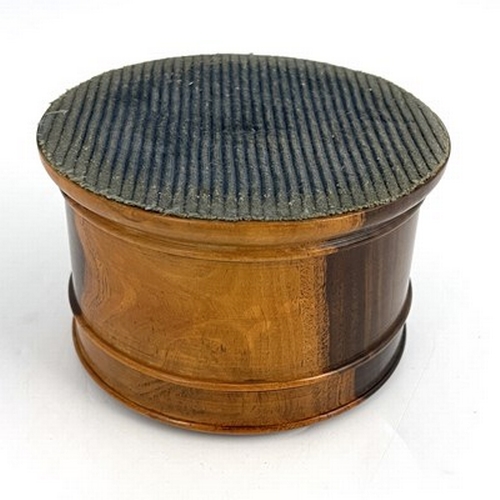 260 - A set of six lignum vitae turned coasters, in associated cylinder box, each piece set with a predomi... 