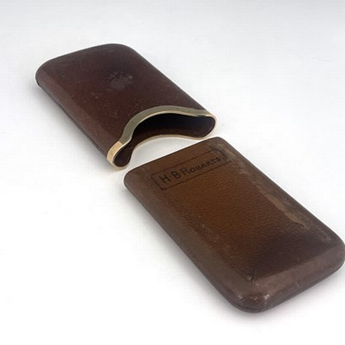 263 - Asprey London, a 9ct gold mounted leather cigar case, London 1917, interior marked H.B. Roberts, 13.... 