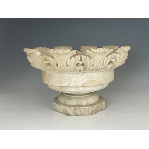 265 - Garden Statuary, an alabaster bird bath support, acanthus and fretwork carved flared opening, octago... 