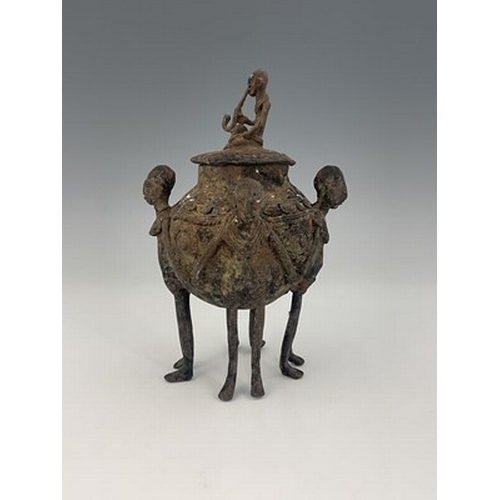 280 - Tribal Interest, Dogon Tribe, a copper tobacco jar, figurative feet, 20cm high