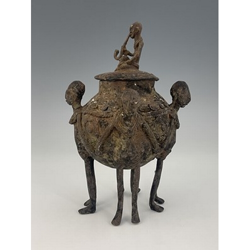 280 - Tribal Interest, Dogon Tribe, a copper tobacco jar, figurative feet, 20cm high