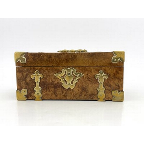 295 - A mid-Victorian burr walnut jewel casket, circa 1860, swing handle, Gothic brass strapwork mounts, a... 