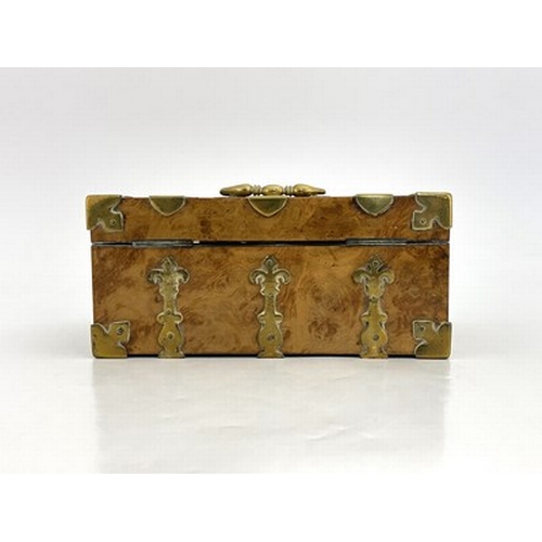 295 - A mid-Victorian burr walnut jewel casket, circa 1860, swing handle, Gothic brass strapwork mounts, a... 