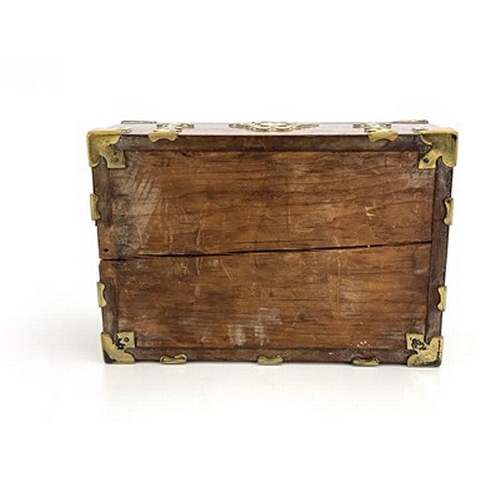 295 - A mid-Victorian burr walnut jewel casket, circa 1860, swing handle, Gothic brass strapwork mounts, a... 