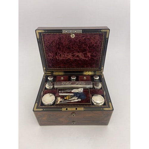 301 - A William IV rosewood and gilt brass strung travelling vanity box, the tooled gilt Moroccan leather ... 