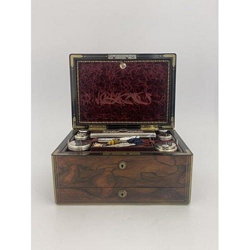 301 - A William IV rosewood and gilt brass strung travelling vanity box, the tooled gilt Moroccan leather ... 