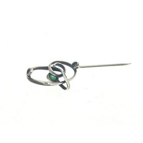 31 - Charles Horner, an Arts and Crafts silver and green gem set brooch, Chester circa 1910, knotted ribb... 