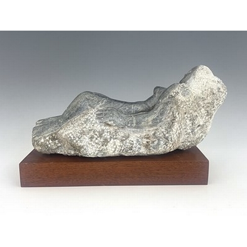 317 - S..Shire (American, 20th Century), reclining female nude, grey marble, 17 by 38cm, on a wooden plint... 