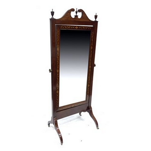 502 - An Edwardian mahogany cheval dressing mirror, circa 1910, swan neck pediment, urn finials, floral ma... 