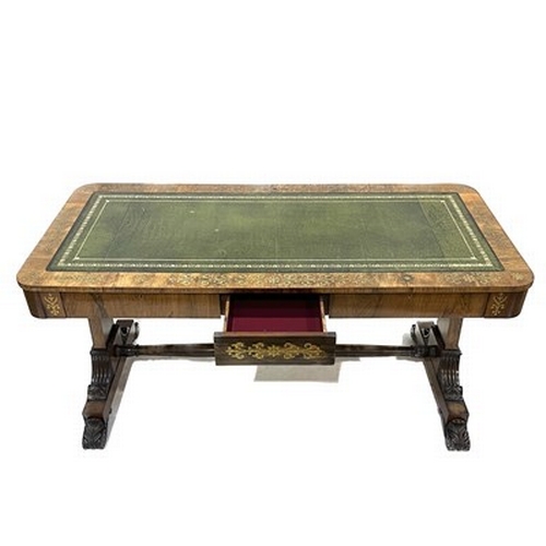 505 - A Regency rosewood library table, circa 1815, gilt-tooled green leather inset top, stylized brass in... 