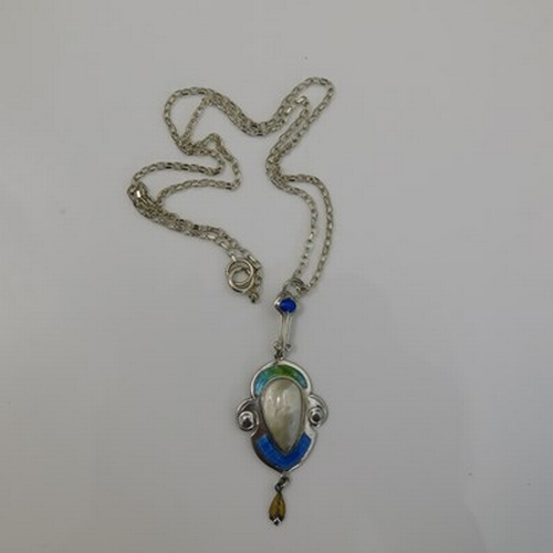 51 - James Fenton, an Arts and Crafts silver and enamelled pendant, Birmingham 1910, the foliate cartouch... 