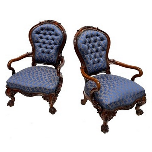 524 - A pair of mid-Victorian rosewood balloon back parlour armchairs, circa 1860, foliate and scroll carv... 