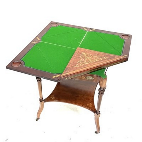 525 - An Edwardian mahogany envelope-action games table, circa 1910, marquetry inlaid, satinwood crossband... 