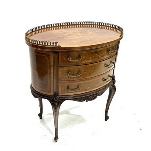 527 - An Edwards & Roberts satinwood oval boudoir table, circa 1900. of Louis XVI design, gilt metal fretw... 