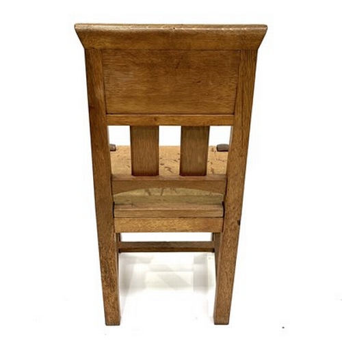 534 - An Arts and Crafts oak and tile chair, possibly Leonard Wyburd for Liberty and Co., turned and chamf... 