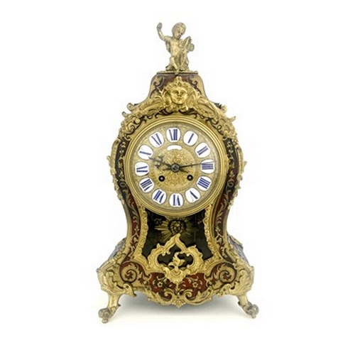 544 - A late 19th Century French boulle work bracket clock, circa 1870, of balloon shape with a cherub fin... 