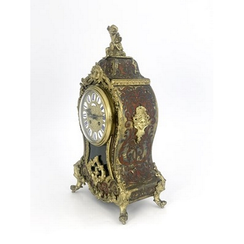 544 - A late 19th Century French boulle work bracket clock, circa 1870, of balloon shape with a cherub fin... 