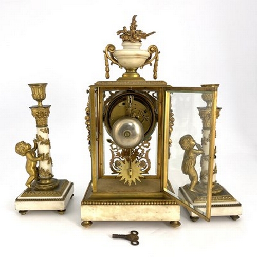 545 - Leroy, Paris, a late 19th Century French clock garniture, gilt metal four-glass case with white marb... 