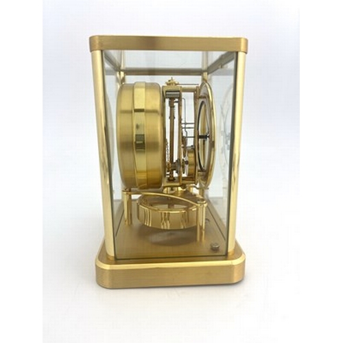 550 - Jaeger Le Coultre, a gilt brass Atmos clock, thirteen jewel Swiss movement, in a cuboid case with fi... 