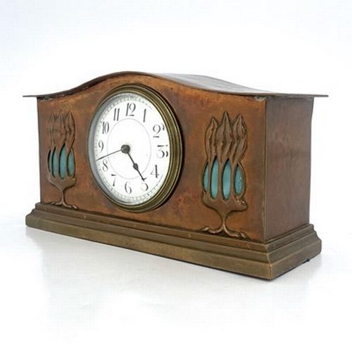 551 - Glasgow School, an Arts and Crafts copper and Ruskin cabochon clock, cuboid plinth form with serpent... 