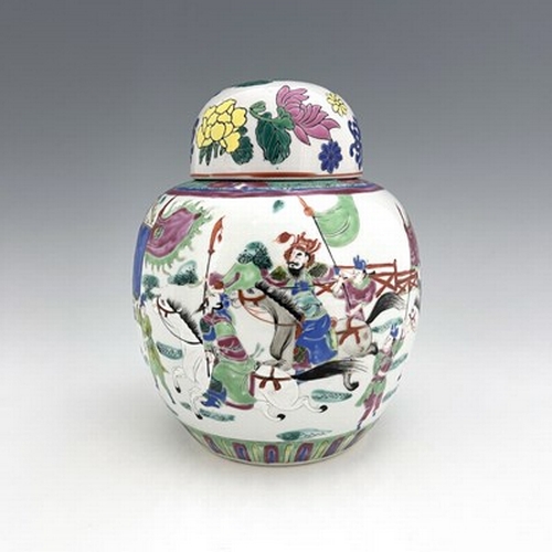 553 - A Chinese famille rose ginger jar, decorated with warriors jousting, with attendants and onlookers, ... 