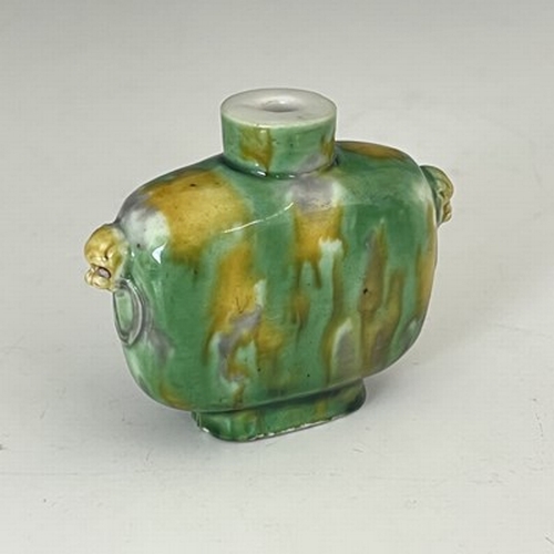 557 - A rare Chinese porcelain snuff bottle, 18th Century, decorated in mottled 'sancai' glazes of yellow ... 