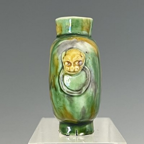 557 - A rare Chinese porcelain snuff bottle, 18th Century, decorated in mottled 'sancai' glazes of yellow ... 