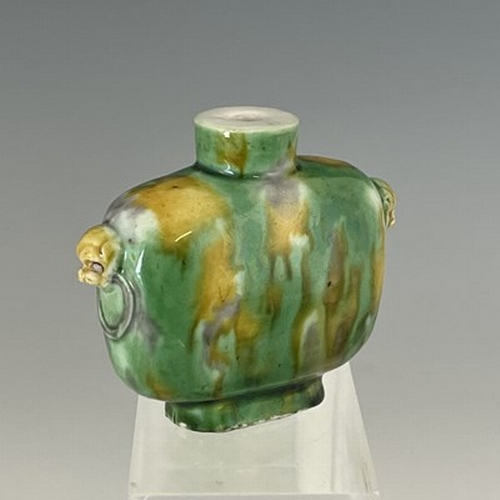 557 - A rare Chinese porcelain snuff bottle, 18th Century, decorated in mottled 'sancai' glazes of yellow ... 