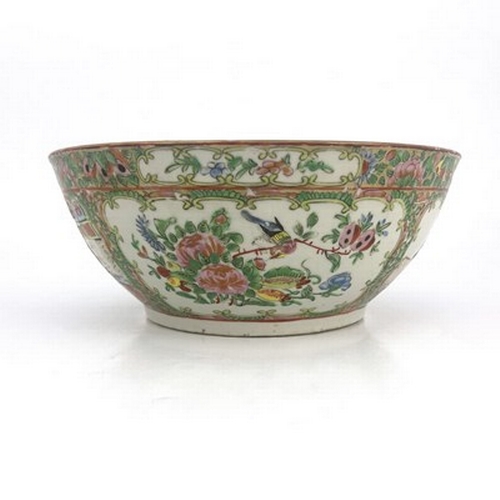 558 - A Chinese Canton Famille rose bowl, Qing Dynasty, 19th Century, decorated with panels of narrative f... 