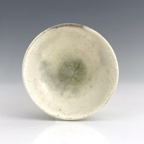 570 - A Chinese qingbai bowl, probably Song dynasty, pale translucent glaze over white painted earthenware... 