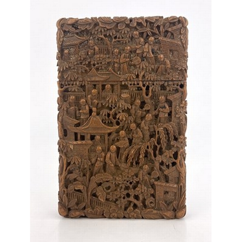 573 - A Chinese carved wood cardcase, modelled in relief with an extensive populated garden landscape of t... 