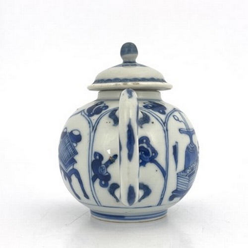 578 - A Chinese blue and white teapot and cover, 18th century probably Kangxi, painted with panels depicti... 