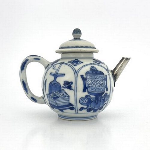 578 - A Chinese blue and white teapot and cover, 18th century probably Kangxi, painted with panels depicti... 