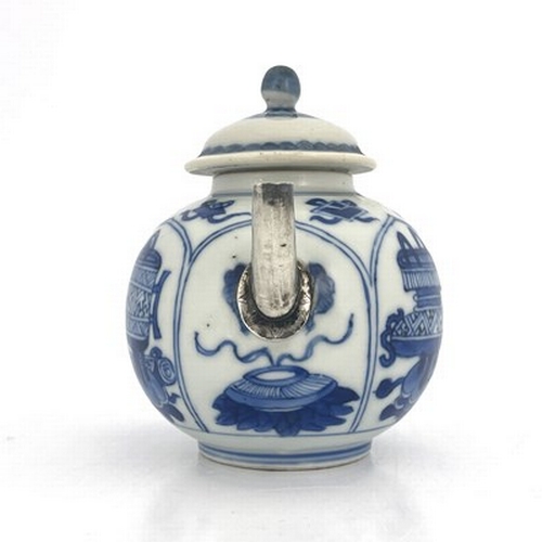 578 - A Chinese blue and white teapot and cover, 18th century probably Kangxi, painted with panels depicti... 