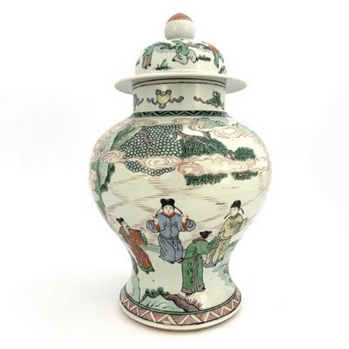 579 - A Chinese famille verte vase and cover, inverse baluster form, painted with Oriental figures, 42cm h... 