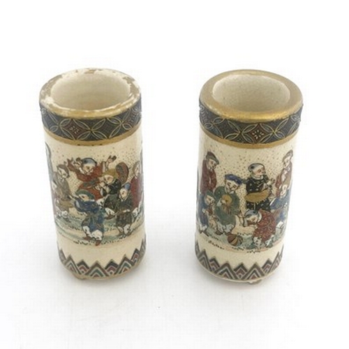 582 - A pair of Japanese Satsuma miniature vases, of cylindrical brush pot form, painted in the round with... 