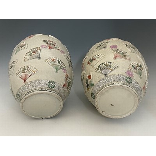 599 - A large pair of Japanese satsuma ware vases and covers, Meiji period, 1868-1912, domed covers with p... 