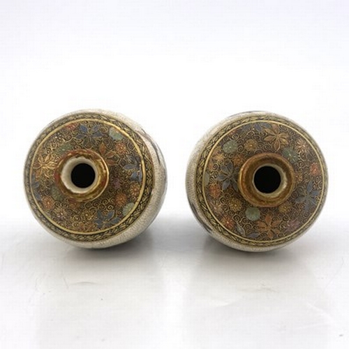 602 - A pair of Japanese Satsuma small vases, 'zan' mark, Meiji, shouldered form, painted in the round wit... 