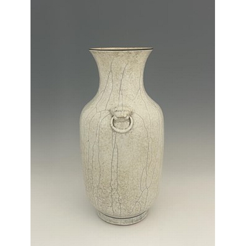 605 - A Chinese twin handled vase, shouldered rouleau form, white oatmeal textured craquelure glaze with r... 