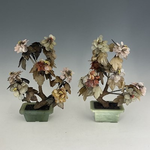 609 - A pair of Chinese hardstone trees, early 20th Century, the leaves in semi-precious translucent stone... 