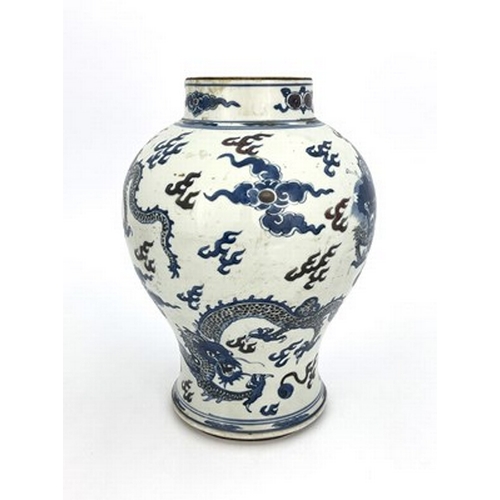 631 - A Chinese vase, Kangxi period, 1662-1722, of baluster form, boldly decorated in underglaze blue and ... 