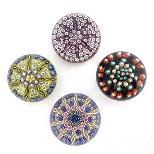 639 - Perthshire and Scottish, four medium sized millefiori glass paperweights, pre 1978, three with flora... 