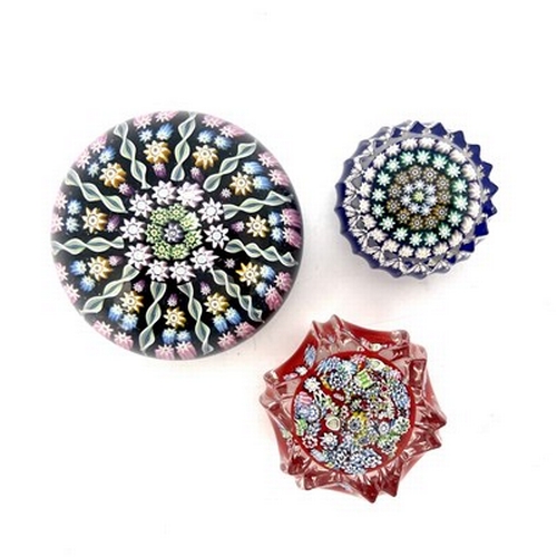 641 - Perthshire and Peter McDougal, three millefiori glass paperweights, including two miniature concentr... 