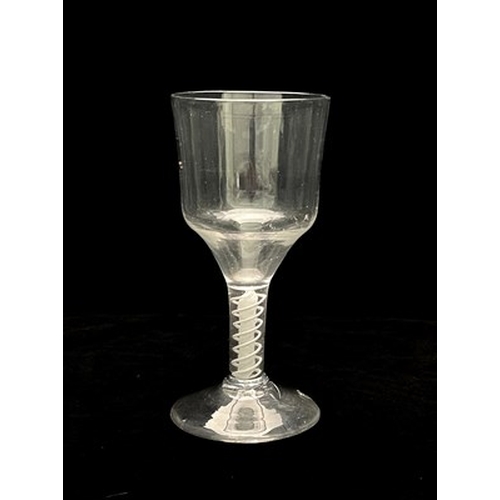 650 - A double series opaque twist large wine glass or goblet, circa 1770, the ogee bowl on a double stran... 