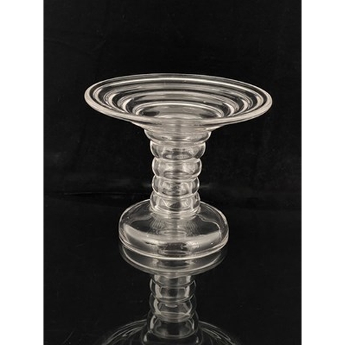 651 - An 18th century ribbed glass ham stand, circa 1790, trumpet form with multi knopped shaft, domed foo... 