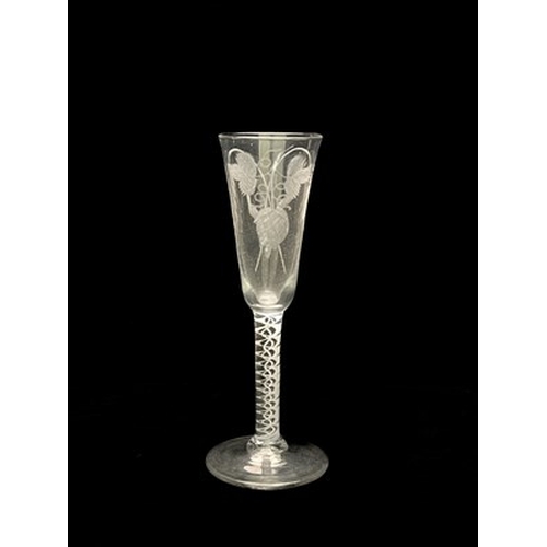 654 - A double series opaque twist ale flute, circa 1760, the round funnel bowl etched and engraved with h... 