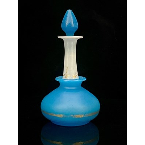 664 - Baccarat (attributed), a blue and white opaline glass perfume bottle, circa 1840, the squat bulbous ... 