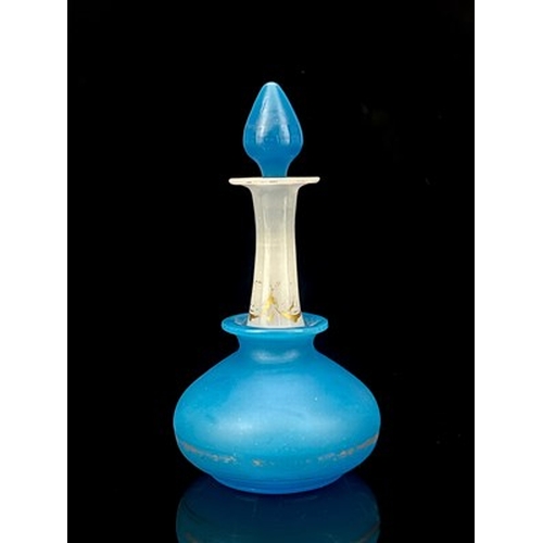 664 - Baccarat (attributed), a blue and white opaline glass perfume bottle, circa 1840, the squat bulbous ... 